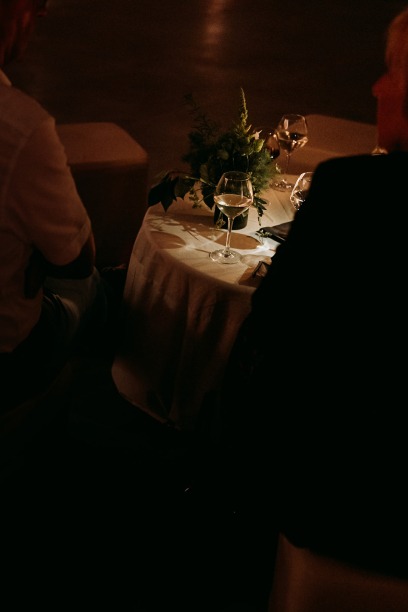 glass of wine in low lit environment