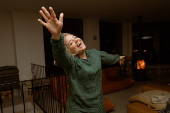 girl in green dress dancing