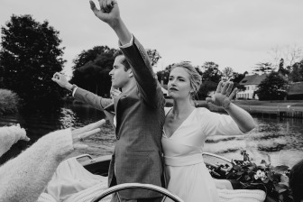 married couple dancing on a boat
